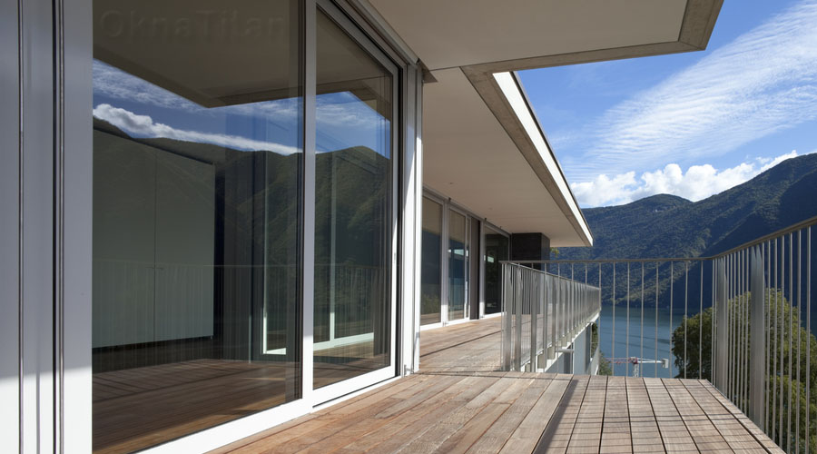 Популярные панорамные двери в компании «Окна Титан» СПб. Системы открывания марки HS Portal – стильное и эргономичное решение